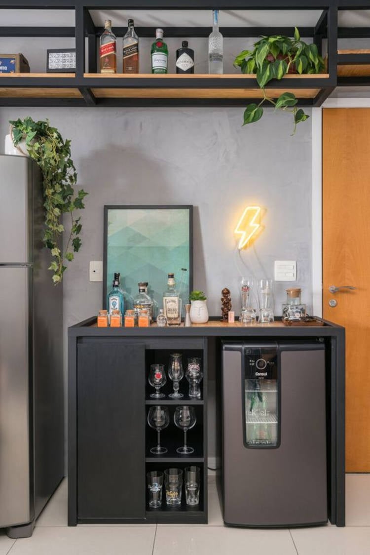 Wine cellar in small apartment in the kitchen.