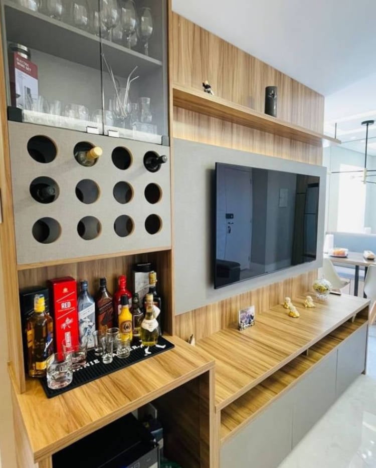 Living room with wine cellar, bar and china cabinet.