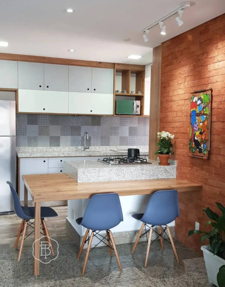 Integrated kitchen with dining room.