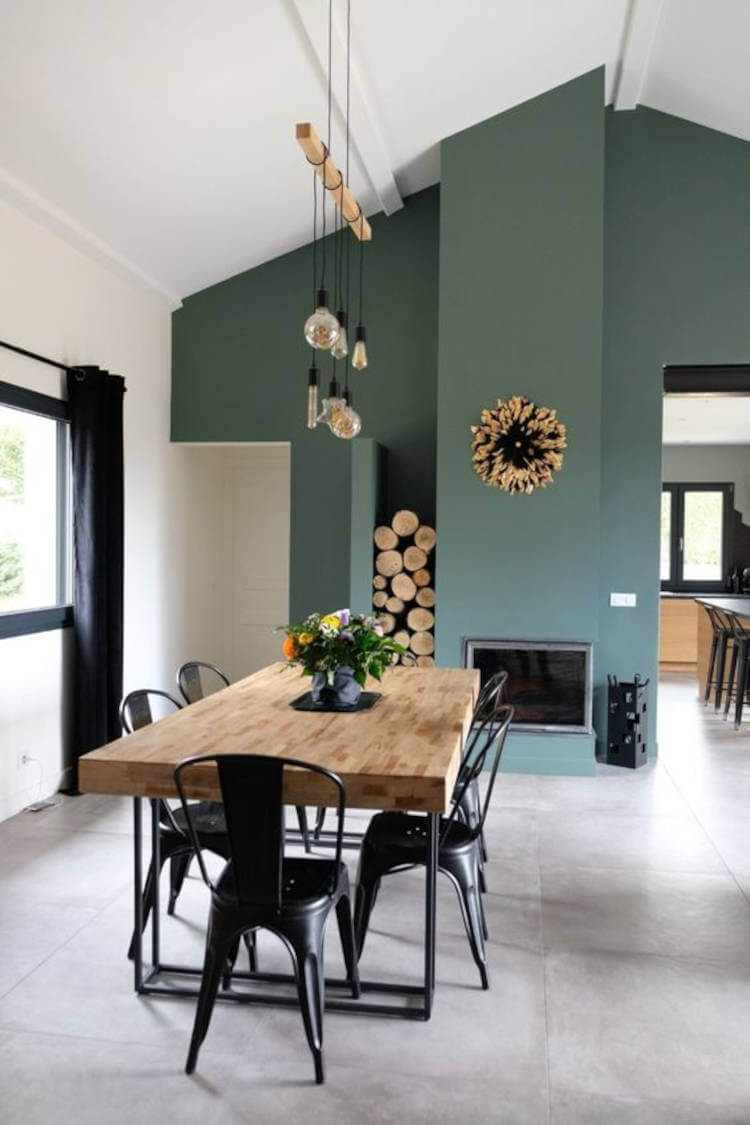 Kitchen with green wall.