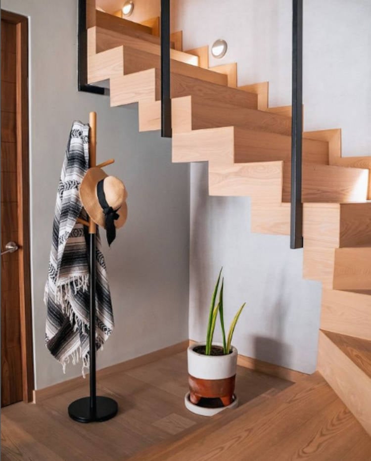 Wooden staircase with functional design.