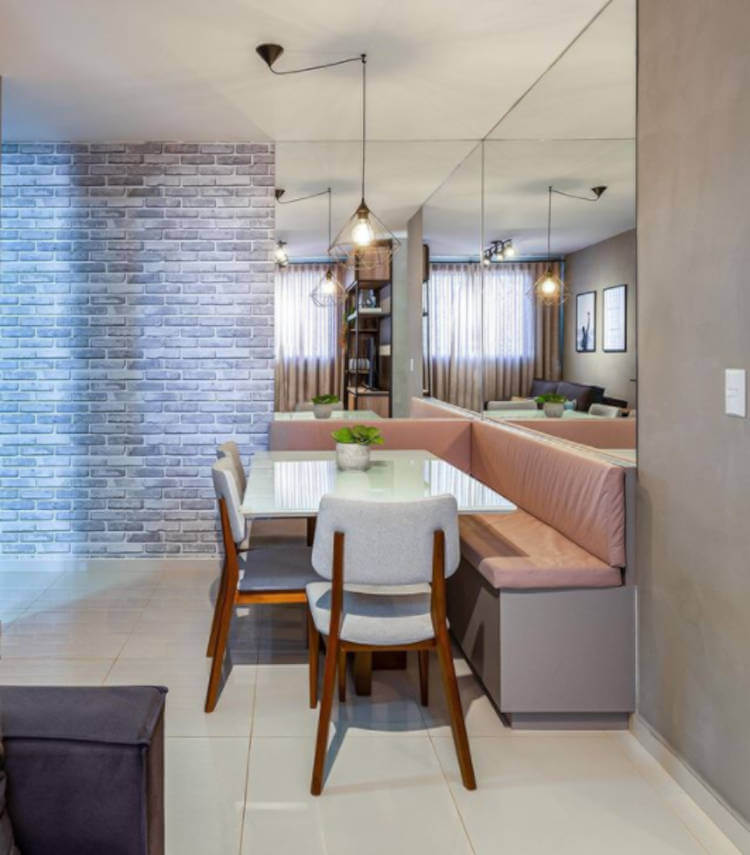 Mirror in the dining room offers functional design.