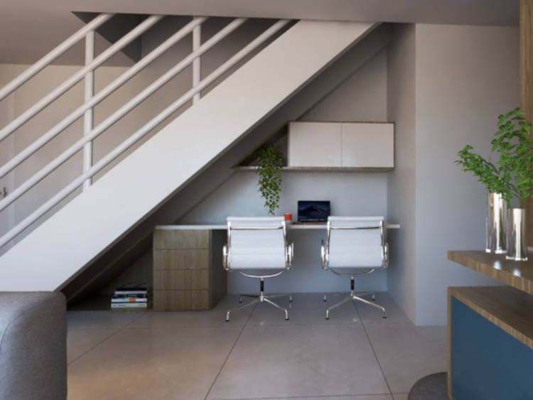 Staircase with home office below.