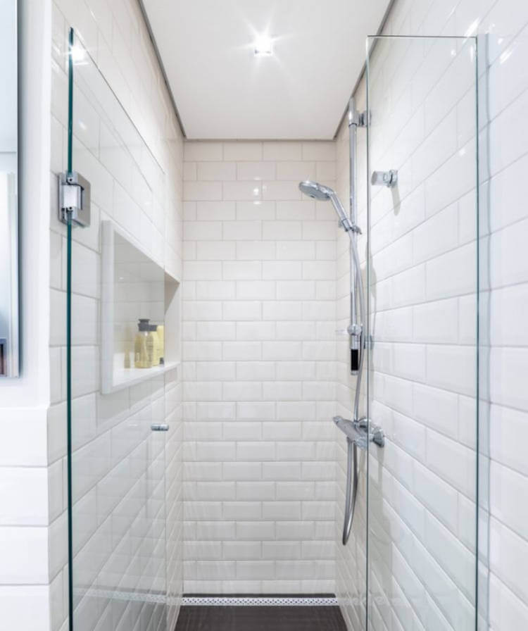 Bathroom with white covering on all walls.