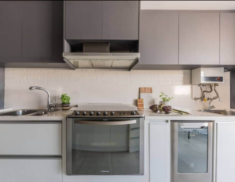 Kitchen with gray cabinet.