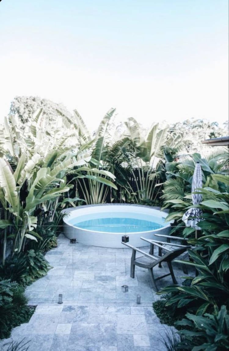 Glass wall surrounding the pool. 