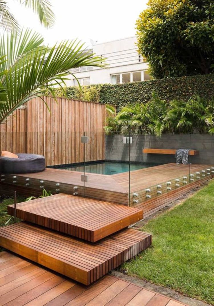 Backyard with glass wall.