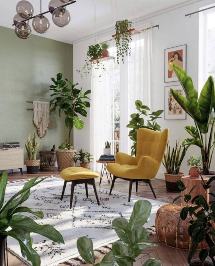 Living room with yellow armchair and footrest.