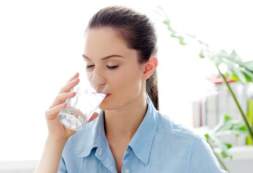 girl drinking water