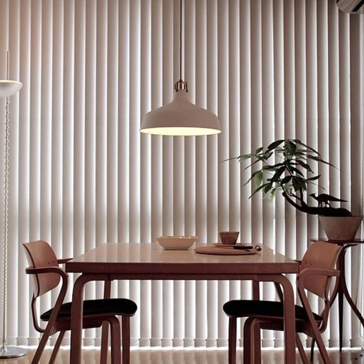 Dining room with curtain.