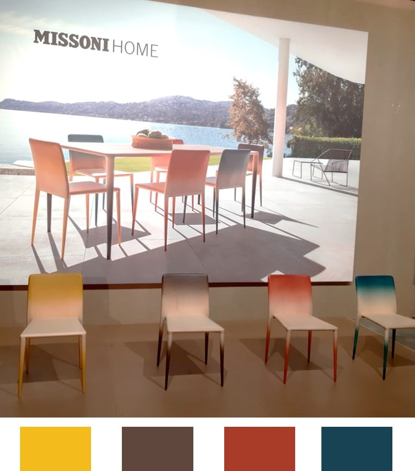 Missoni home's space at the Milan Furniture Fair with colorful outdoor chairs.