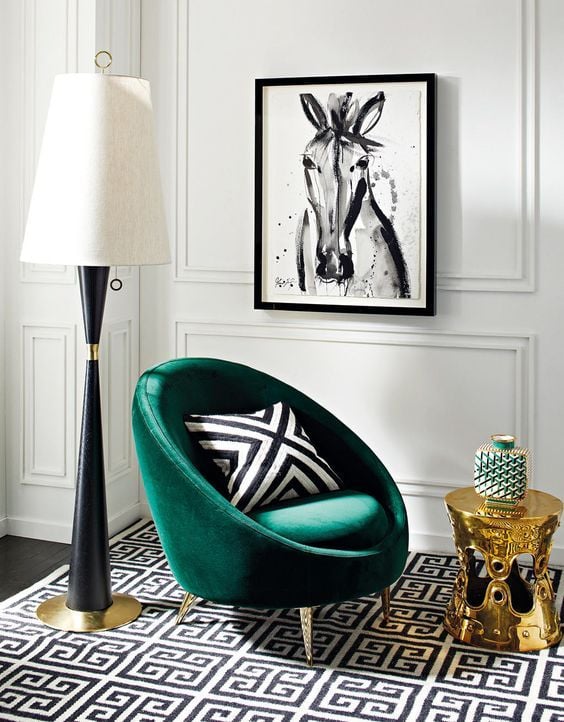 Armchair with green velvet.