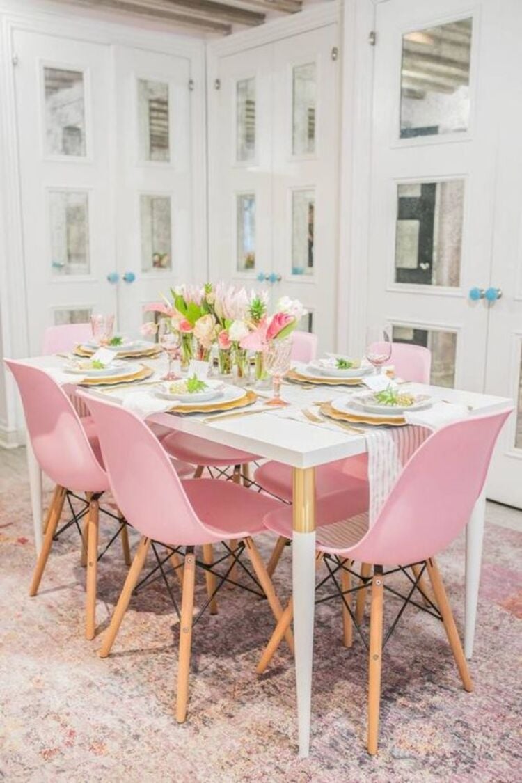 Pink in the decoration of the chairs.