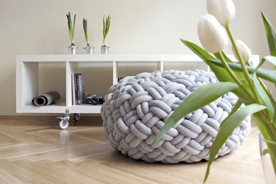 Large knot cushion pouf.