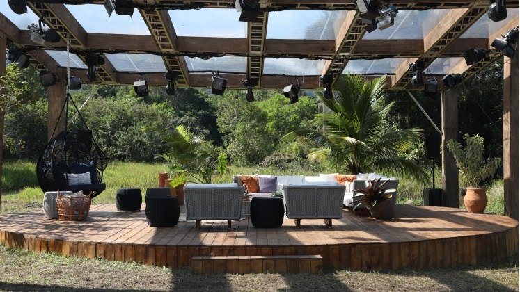 White sofas on the balcony.