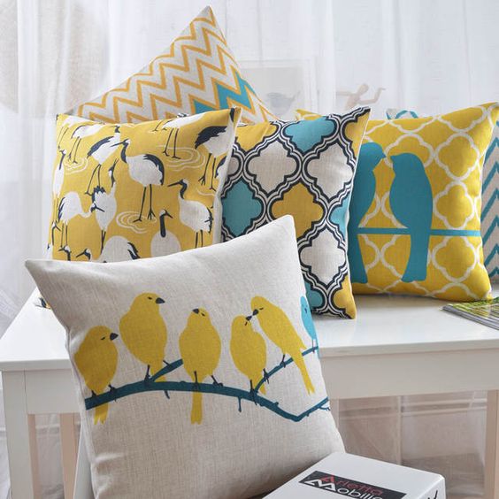 Cushions with bird designs.