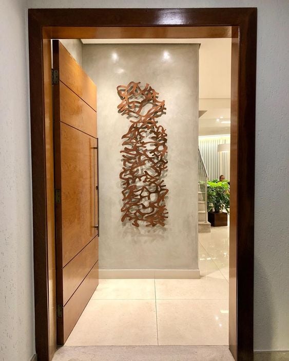 Sign home decoration with abstract sculpture on the wall. 