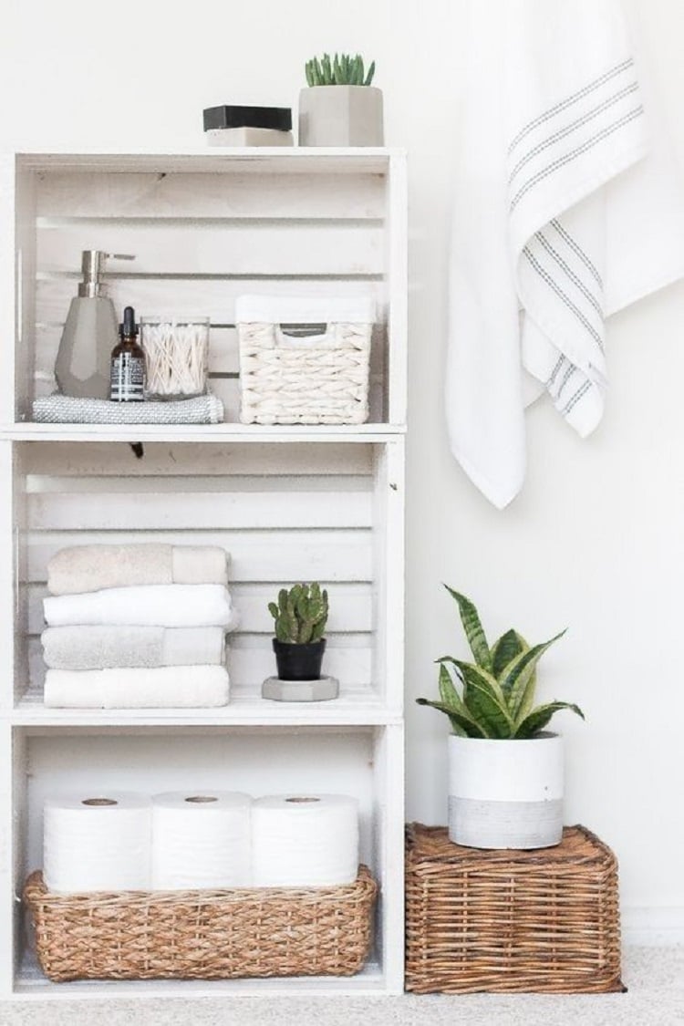 White bins in the bathroom.