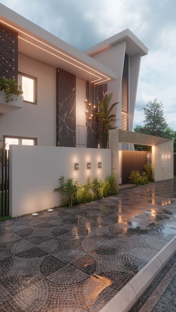 Illuminated residential wall with garden.