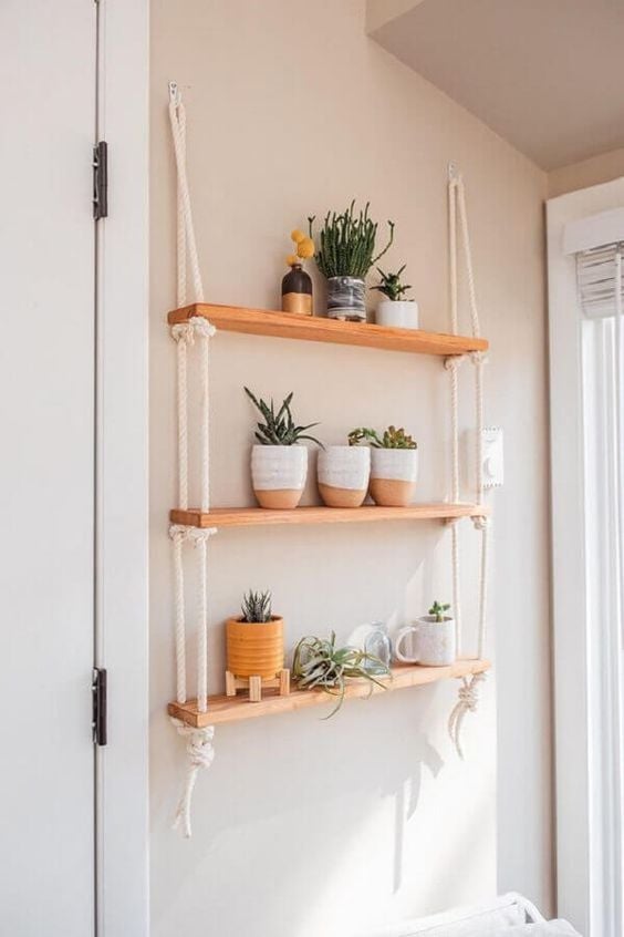 Shelf for bedroom with succulents.