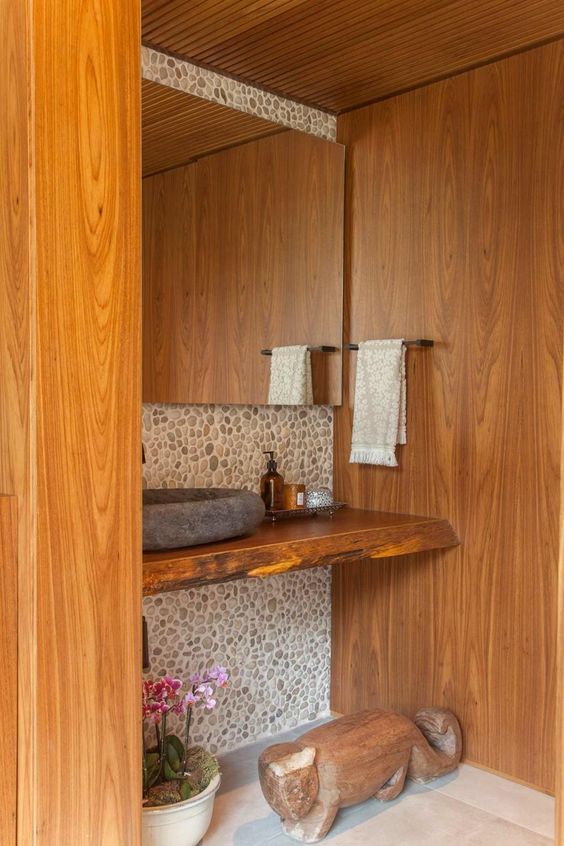 Bathroom with rustic pebbles.