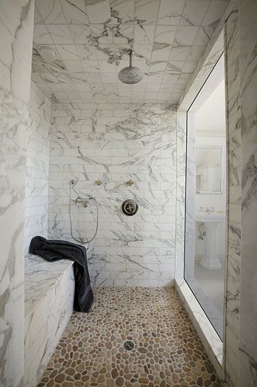 Bathroom with pebbles and tiles.