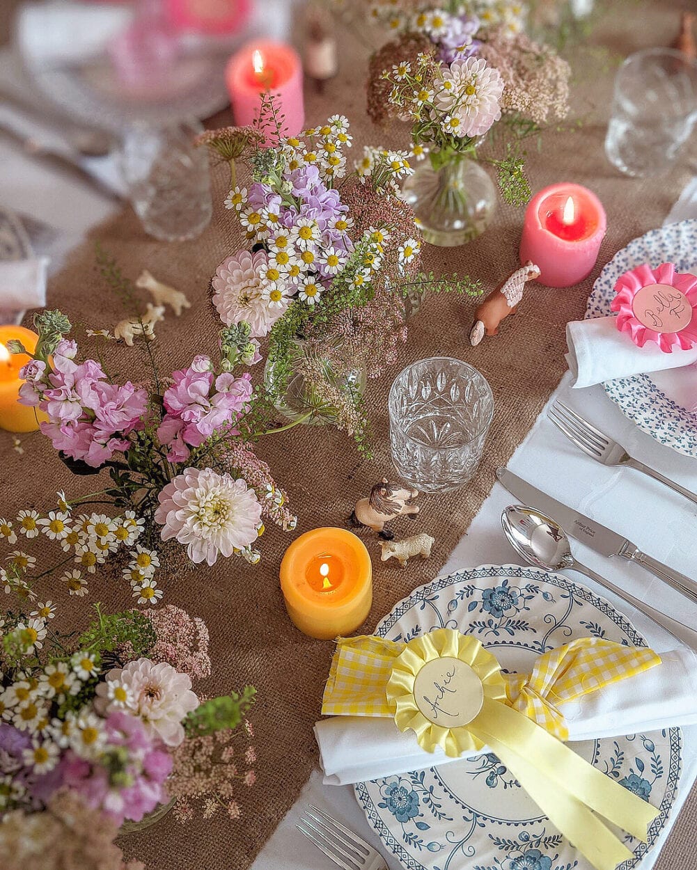 Romantic dinner table decorated with wild flowers