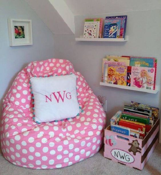 Reading corner with shelves with children's books.