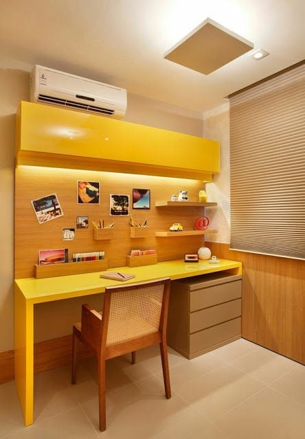 Home office with wooden panel.