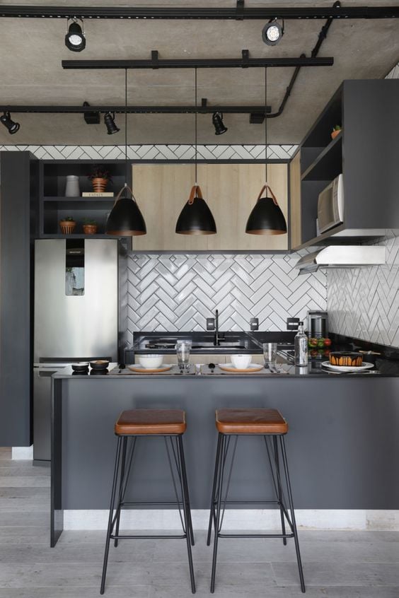 Kitchen with white tiles.