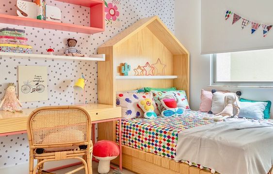 Girl's room with wooden furniture.