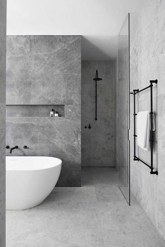 Gray bathroom and white bathtub