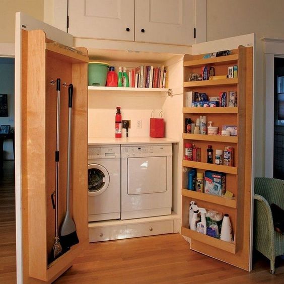 Closet with washing machine.