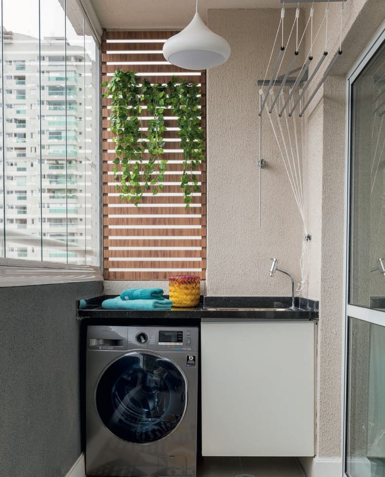 Small laundry room with vertical garden