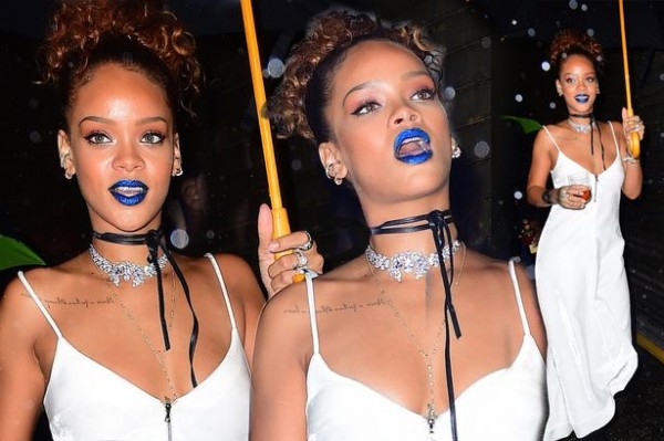 Rihanna in blue metallic ankle boots