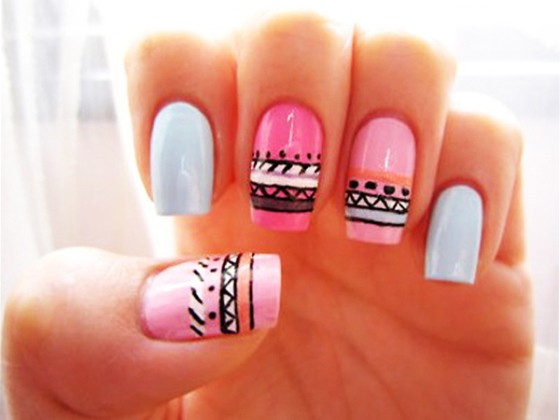 nail model decorated with ethnic prints