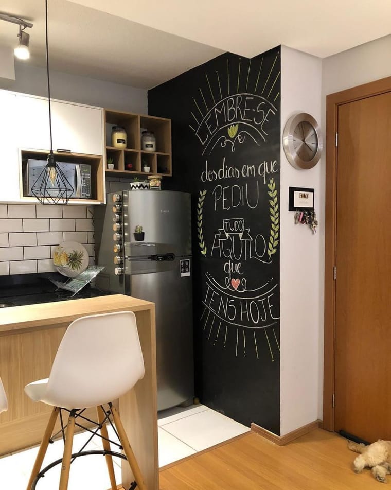 Kitchen with phrase on the wall 