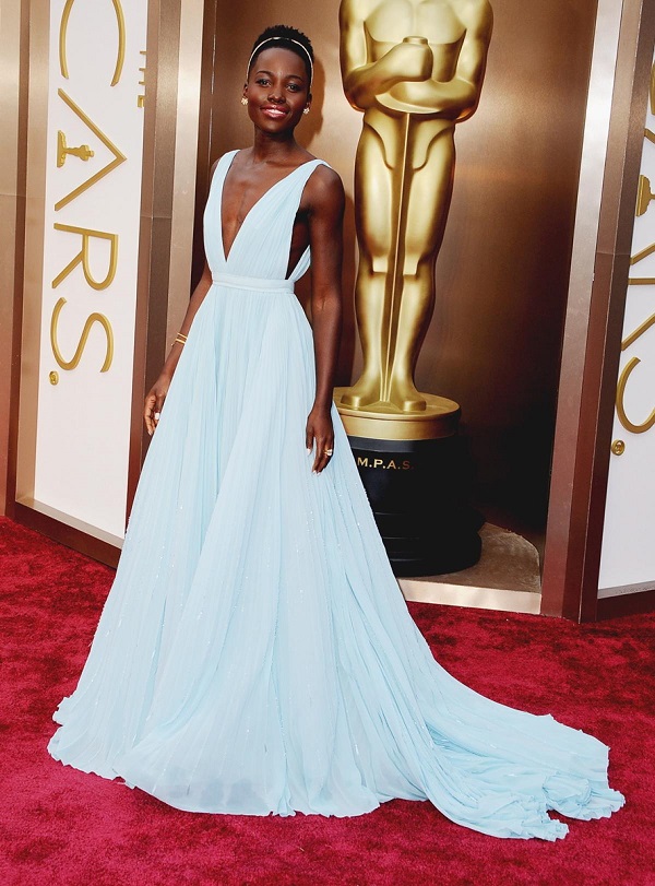 Lupita Nyongo shows how to match nail polish to your party dress