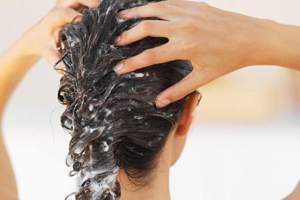 Learn how to remove coconut oil from your hair without making it oily