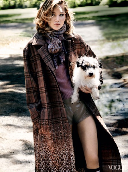 Jennifer Lawrence holding a dog