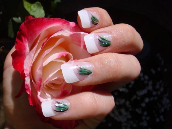 nails decorated with green branches