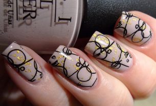 Modelo de Nail Art Preto com Dourado