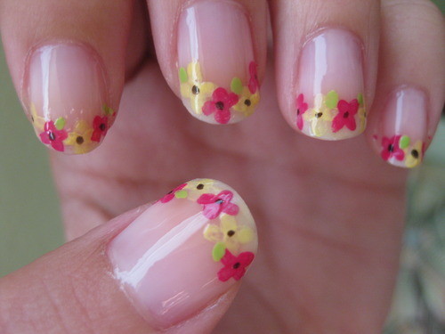 photo of Nails decorated with flowers