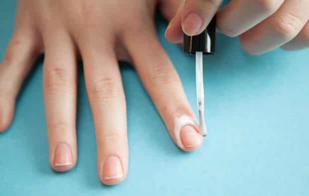 applying cream to the cuticle