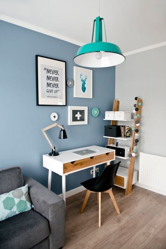 Blue home office in the living room.