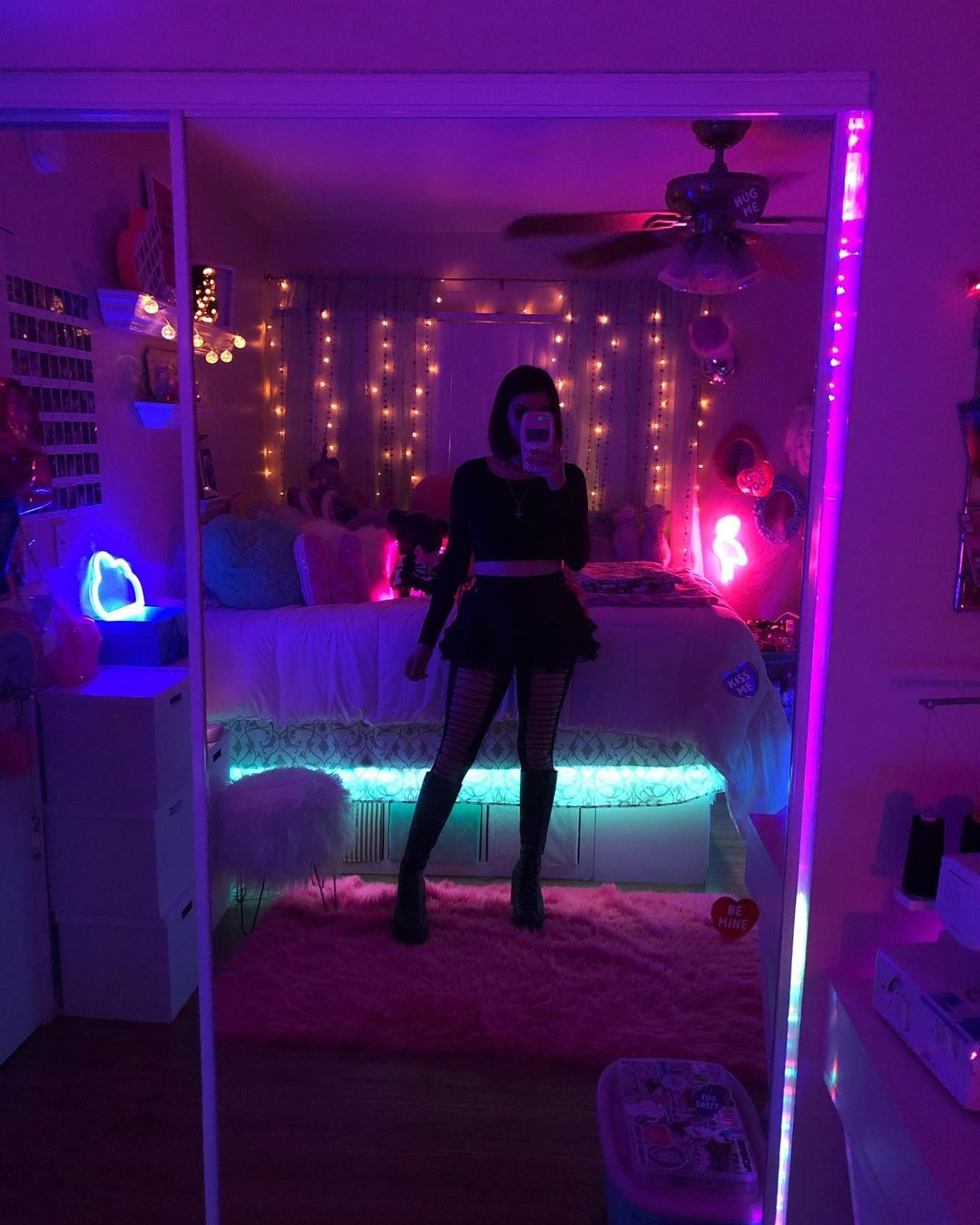 Photo in a bedroom mirror with LED lights and neon effect