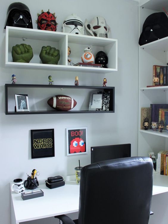 Room with geek decor in niches and shelves.