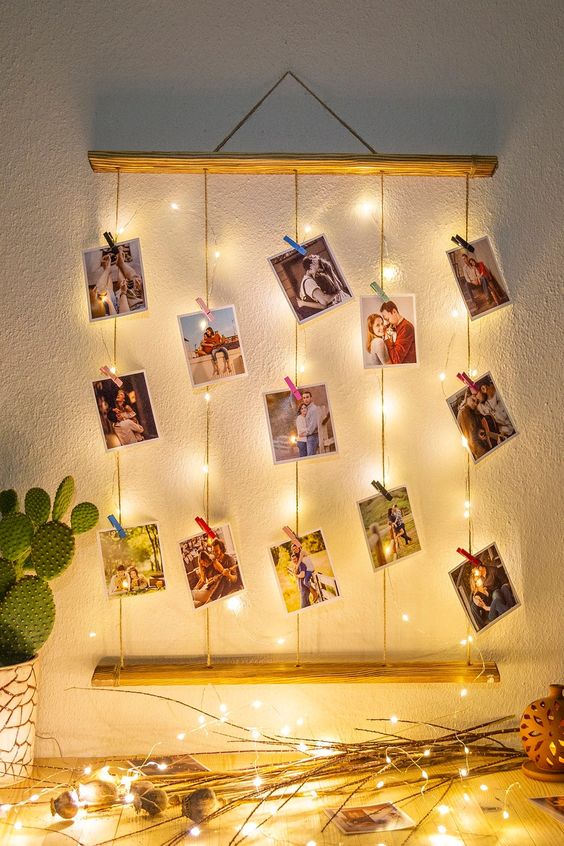 Vertical clothesline with photos.