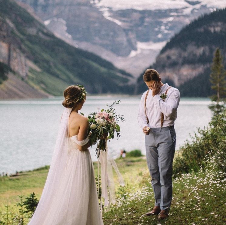 bride meets groom crying in a beautiful landscape