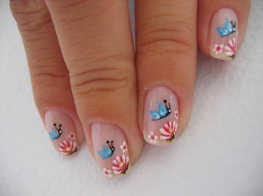 nails decorated with butterflies